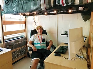 Freshman Cole Stewart in his dorm room in Sullivan Residence Hall
