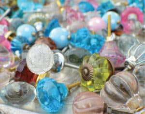 Glass Drawer Pulls, $8. Lovely knobs in all sorts of colors and textures make easy upgrades to flea market furniture.