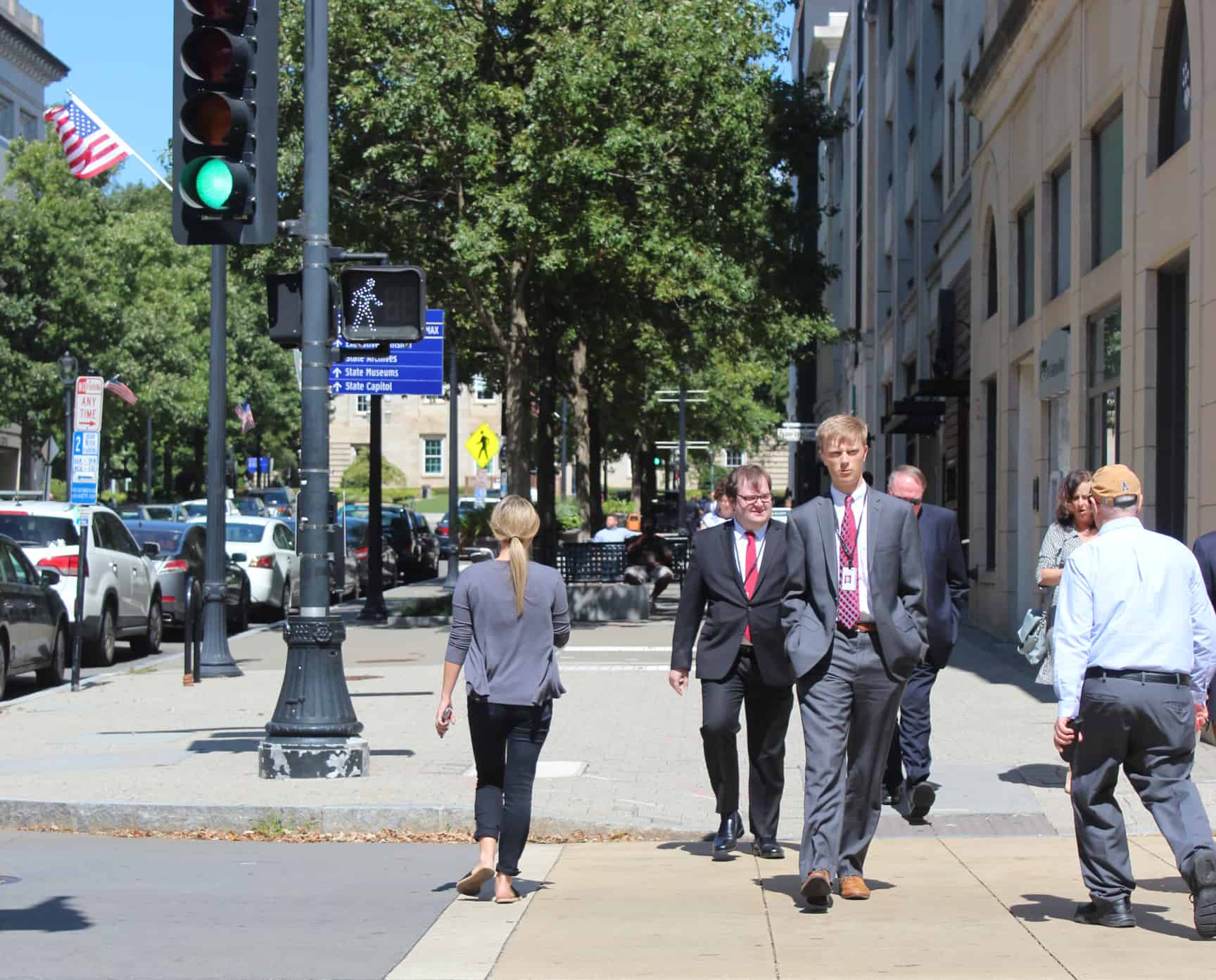 Pedestrians crossing a street in Downtown Raleigh